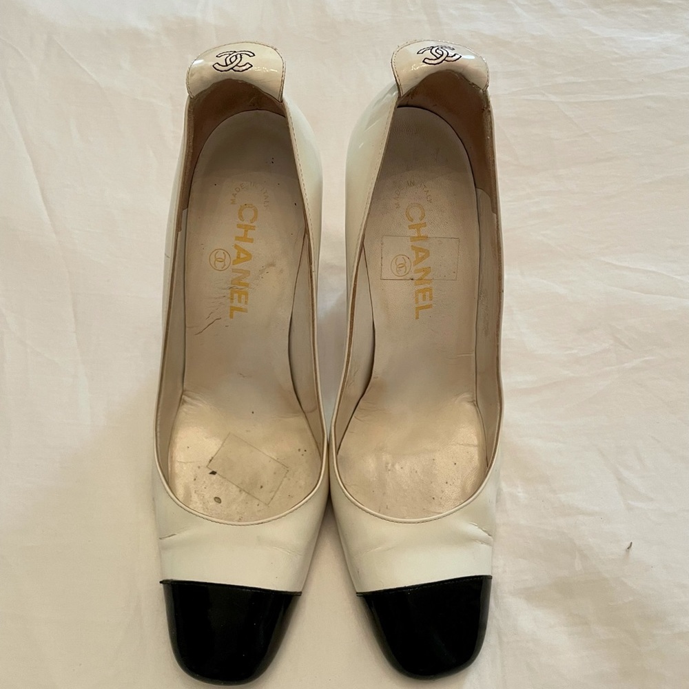 Chanel black cap toe white patent pumps